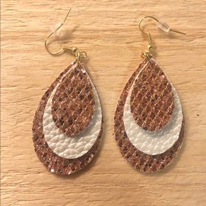 Handmade layered leather earrings.
